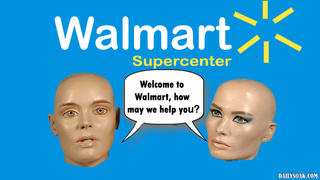 Two Mannequins standing in front of a Walmart sign.