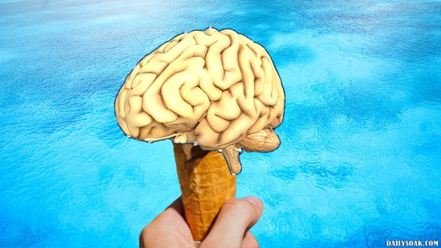 Brain on an ice cream cone getting ready to be eaten.