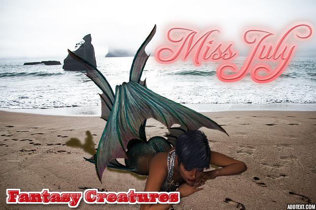 Parody of Sports Illustrated calendar with a mermaid lying on the beach posing as Miss July.