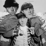 Three Stooges with Moe Howard's head on all three stooge's bodies in a satire photo.