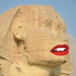 Parody Egyption pyramid with big red lips.