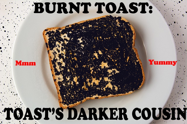 Piece of burnt toast on a white plate.