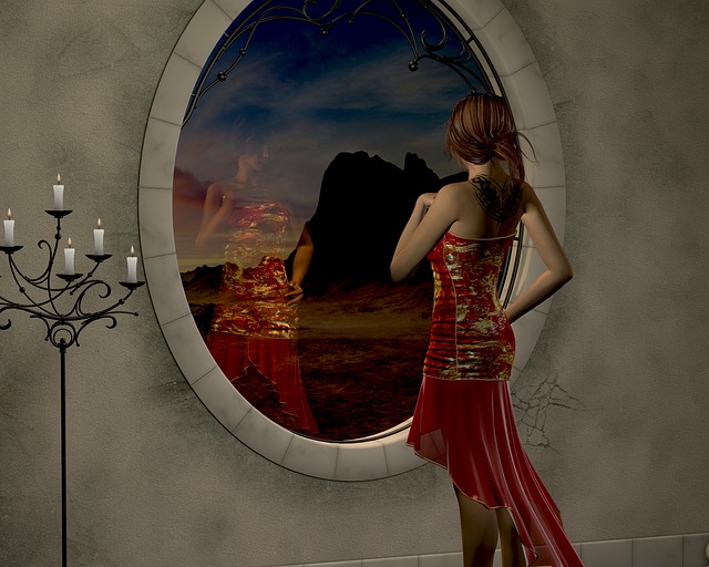 Woman in red dress staring at her reflection in window.