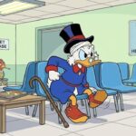 Scrooge McDuck standing inside his vault of gold.