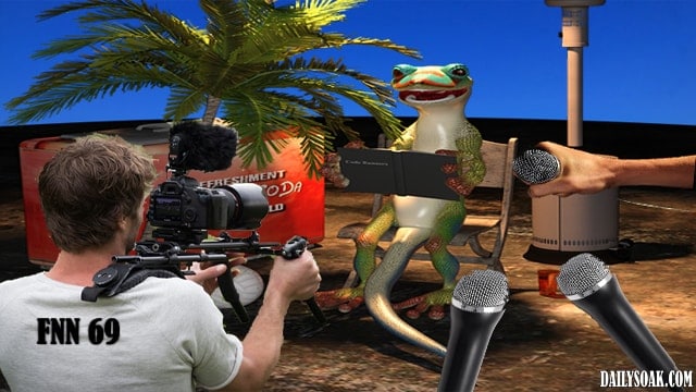 Geico Gecko parody giving interview on beach.