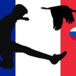 Silhouette of World Cup soccer player against French flag.