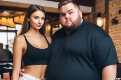 Big guy standing next to a skinny woman inside of a restaurant.
