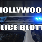 Police blotter words on police car.
