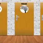 Three brown bathroom doors against white brick wall.