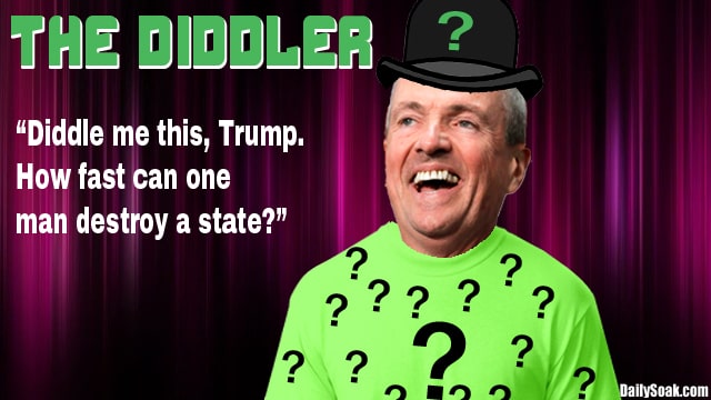 Phil Murphy dressed as Riddler in green shirt and hat.