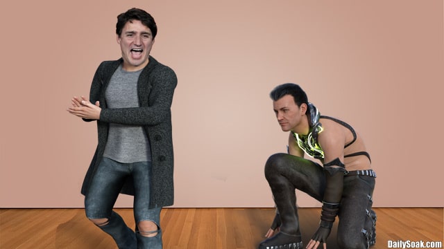 Justin Trudeau wearing sweater next to kneeling white man.
