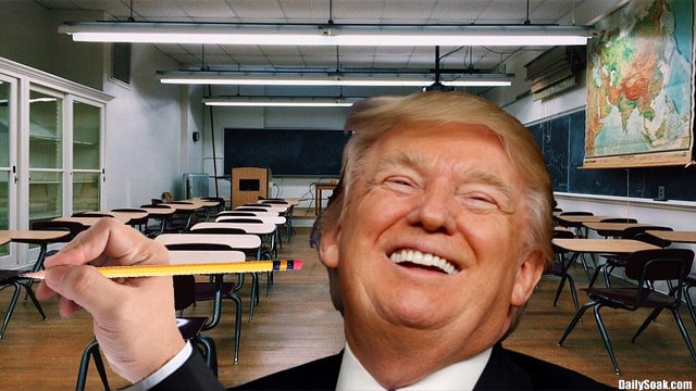 Donald Trump laughing while standing inside classroom.