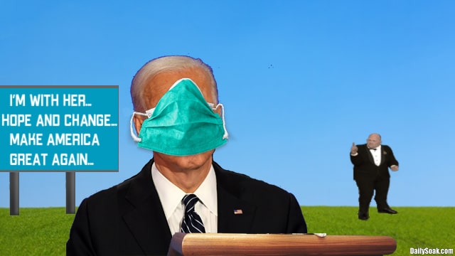 Joe Biden wearing extra large mask while standing outside.