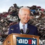 Joe Biden behind podium inside landfill giving a speech to the news media.