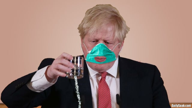 Boris Johnson wearing face mask with mouth hole holding glass.