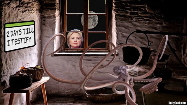 Hillary Clinton looking inside house at the Kraken.
