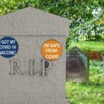 Gray funeral home tombstone with RIP on it in sunny cemetery.