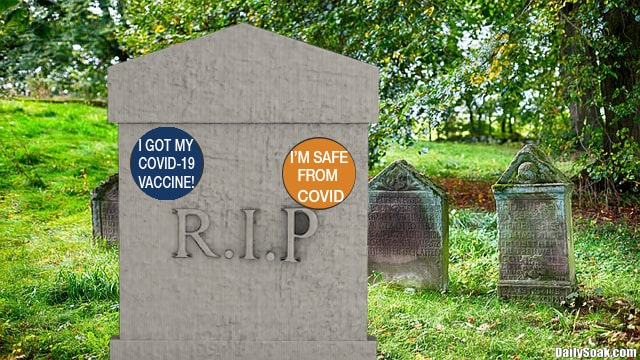 Gray funeral home tombstone with RIP on it in sunny cemetery.