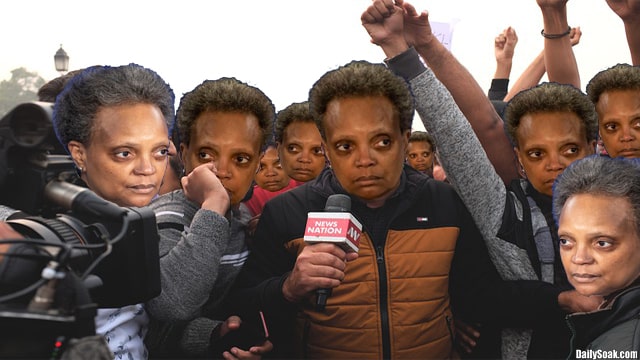Numerous people in a crowd who look exactly like Lori Lightfoot.