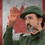 Justin Trudeau wearing green army uninform in front of Canada flag.