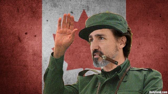 Justin Trudeau wearing green army uninform in front of Canada flag.