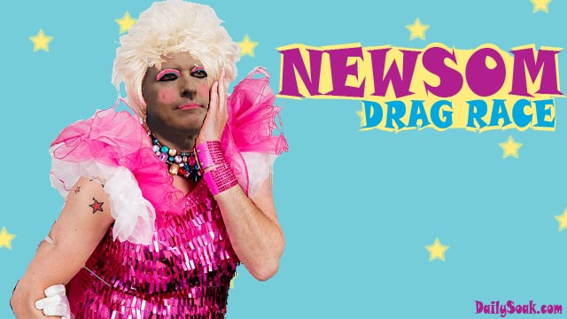 Gavin Newsom wearing a pink dress and blonde wig against blue background.