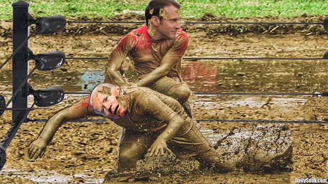 Joe Biden and Emmanuel Macron wrestling in brown mud.