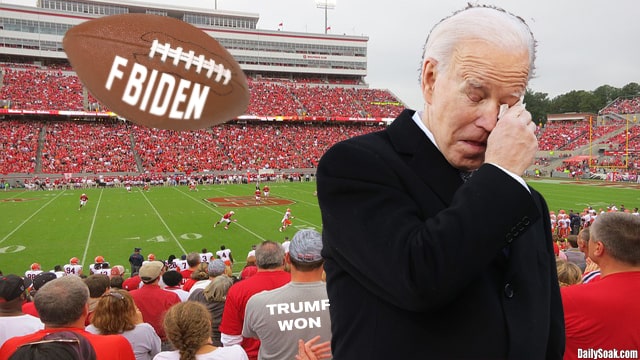 Joe Biden wearing black coat and crying inside sports stadium.