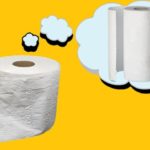 White toilet paper roll and paper towel set against yellow background.