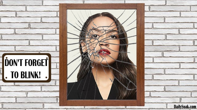 AOC staring into broken mirror on white brick wall inside Capitol Building.