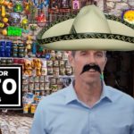 Beto O'Rourke wearing white sombrero in front of a Mexican store.