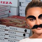 Book author Chrissy Teigen sporting new hairy eyebrows and mustache.