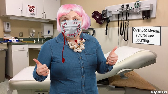 Fat woman wearing blue shirt and face mask inside doctor's office.