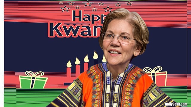 Elizabeth Warren wearing orange African shirt against Kwanzaa background.