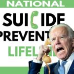 Joe Biden wearing blue suit and screaming into a yellow rotary phone.