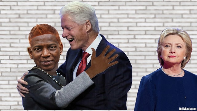 Hillary Clinton watching Bill Clinton hug a black woman.