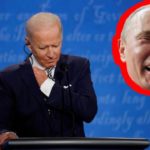 Joe Biden listening to earpiece as Russian Vladimir Putin laughs.