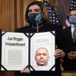 Nancy Pelosi holding up articles of impeachment against Joe Rogan.