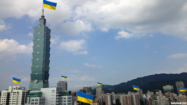 Ukraine flags flying over buildings in Taiwan.