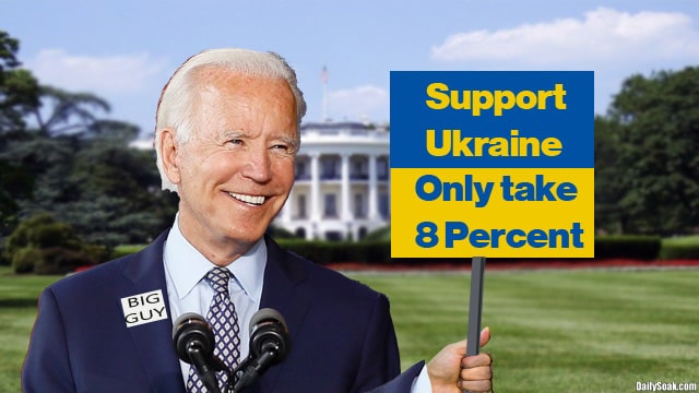 Joe Biden holding Ukraine flag in front of White House.