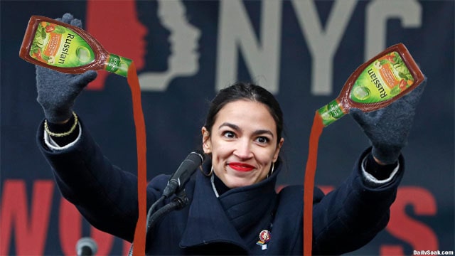 AOC holding bottles of Russian dressing at a podium.