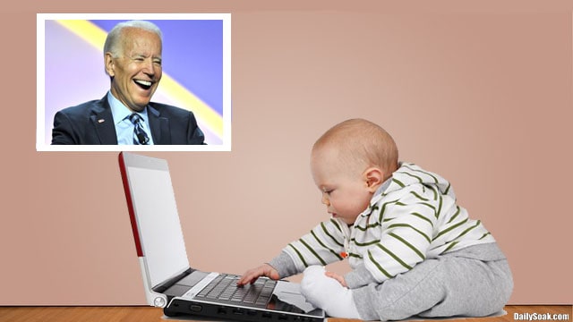 Joe Biden standing near a baby on computer laptop.