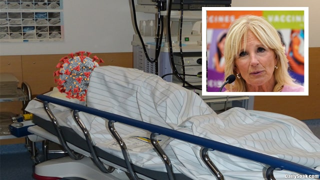 COVID virus lying on hospital bed next to Jill Biden.