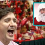 Canada's Justin Trudeau laughing at image of Christmas Santa Claus.