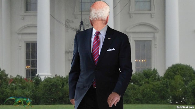 Joe Biden wearing blue suit on backwards in front of White House.