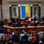 US Congress members saluting the flag of Ukraine on the House floor.