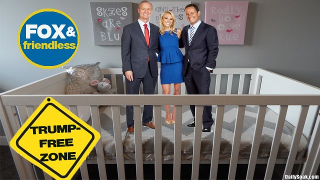 Fox News show Fox & Friends cast members standing inside baby crib.