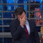 The Late Show host Stephen Colbert crying on TV.