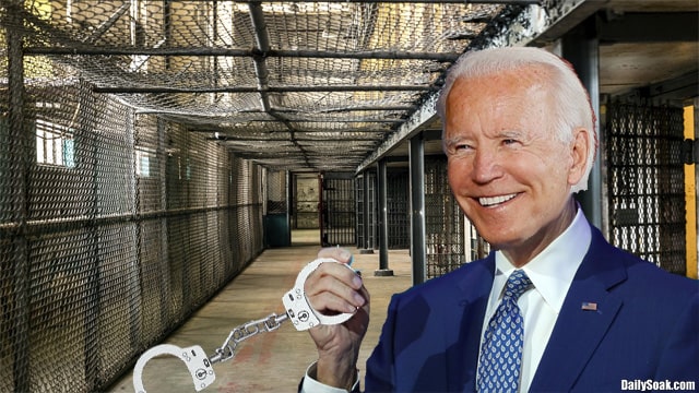 Joe Biden holding handcuffs in front of DOJ prison holding cell.