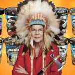 Elizabeth Warren wearing Indian headdress in front of Ben & Jerry's ice cream.